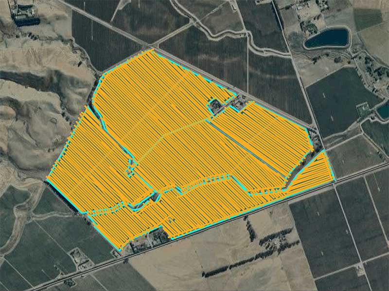 A satelite image with an area marked out  with yellow lines and a blue outline to show a helicopter spraying path
